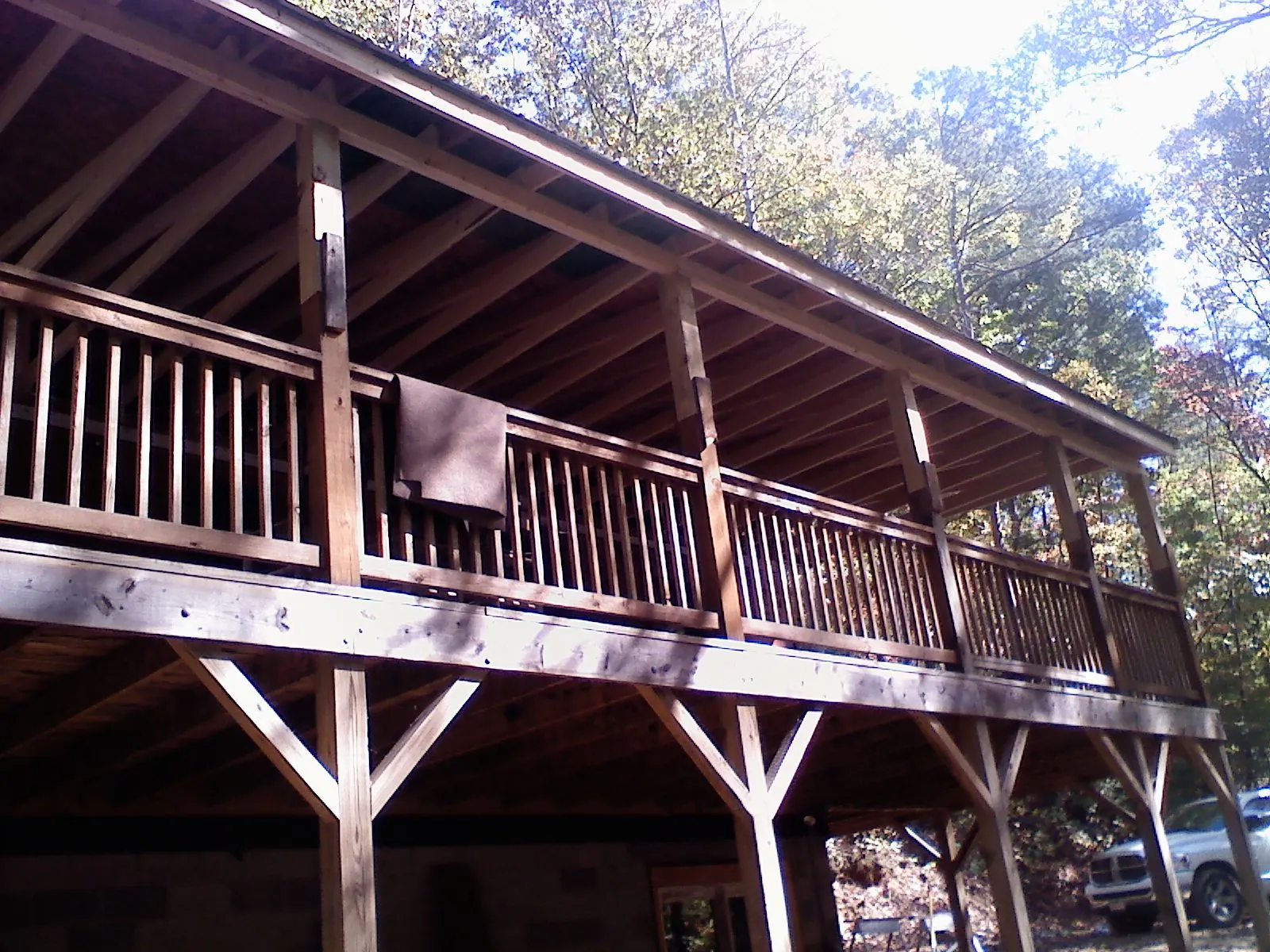 Timber framing under a new elevated porch and deck — Roof Leak Repair in Waynesfield by Roofing Brothers